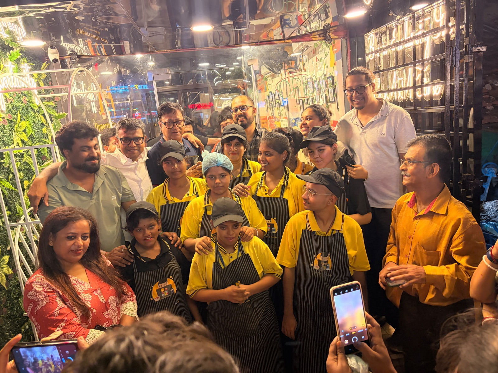 The Opportunity Cafe team with guests at the Sodepur outlet opening